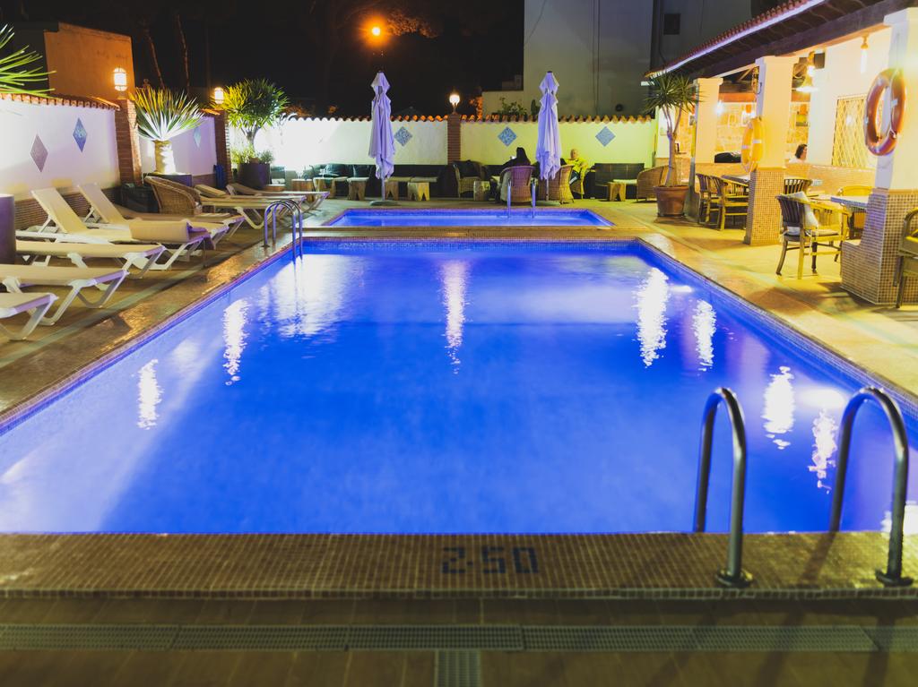 Surf and book in few minutes: Elegant basic apartments with swimming pool in Es Canar, close to the beach and Santa Eulalia.