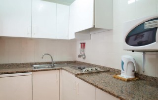 Cozy Apartment with Pool on the beach S.ta Eulalia SEUROS Kitchen - LeibTour: TOP aparthotels in Ibiza