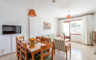 Cozy Apartment with Pool on the beach S.ta Eulalia SEUROS Living Room 2 - LeibTour: TOP aparthotels in Ibiza
