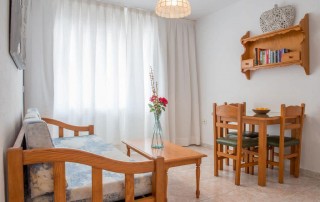 Cozy Apartment with Pool on the beach S.ta Eulalia SEUROS Living Room - LeibTour: TOP aparthotels in Ibiza