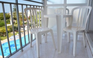 Cozy Apartment with large pool city heart SAN ANTONIO SIRAPSAN Balcony - LeibTour: TOP aparthotels in Ibiza
